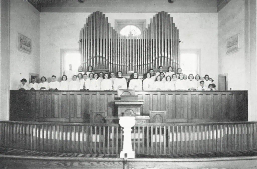 1938 yearbook photo of big organ and choir loft in Schoolfield Memorial Chapel