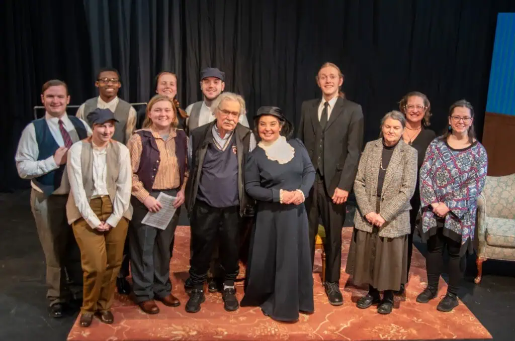 The cast and crew of the January 2025 production of "You Caught Me Dancing" are gathered around the late Ferrum College Professor Emeritus Rex Stephenson, who directed the play.