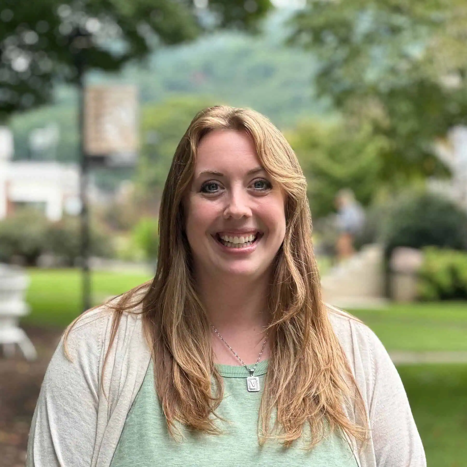 Headshot photo of Ferrum College Student Success Coach Rachel Villa taken outside on campus